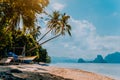 Banca boat on shore under palm trees.Tropical island scenic landscape. El-Nido, Palawan Royalty Free Stock Photo