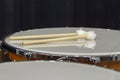 Band Drumsticks on Timpani Kettle Drums Royalty Free Stock Photo