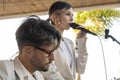 Band duo singer and guitar player in beach bar restaurant Royalty Free Stock Photo