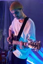 Band Player with Semi-Acoustic Guitar in Studio