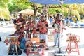 Haitian musicians entertaining tourists at the beach.