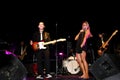 Band on Stage with Female Singer