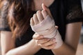 Bandaged hand in light and shadow Royalty Free Stock Photo