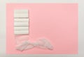 Bandages In Rolls On A Pink Background, Top View. The Concept Of First Aid For Injuries, Sprains, Dislocations And Fractures