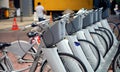 Bicycles for rental stand in a row on city street at Dataran Pahlawan, Melak