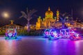 BANDAR SERI BEGAWAN, BRUNEI - FEBRUARY 26, 2018: Illuminated toy cars in front of Omar Ali Saifuddien Mosque in Bandar