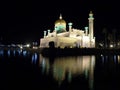 Reflections in the water of the lake of the Sultan Omar Ali Saifuddin Mosque in Brunei Royalty Free Stock Photo