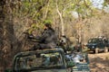 Bandhavgarh, madhya pradesh, india - 25 April 2022 : wildlife cinematographer or photographer above on safari vehicle filming