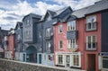 BANDON, COUNTY CORK, IRELAND. MARCH 29, 2022. Facades of small offices and cafe. Street view to small town