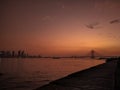 Bandra worli sea-link bridge in sea at Bandra, Mumbai with Mumbai's skyline behind it