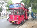 Bandros or a very beautiful red Bandung tour bus parked on the side of the city road Royalty Free Stock Photo