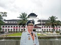 Ridwan Kamil stand in front of Gedung Sate, banner, two-dimensional cardboard statue, standee