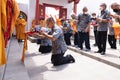 Bandung, Indonesia - January 8, 2022 : Buddhist People pray together with the monks while giving the offering in front of the