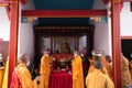 Chief monks doing greetings to the god while praying