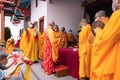 Chief monks lead the praying process for the visitors and the servant