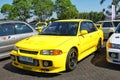Modified yellow Mitsubishi Lancer Evolution III in JDM Fest 2025 car meet event Royalty Free Stock Photo