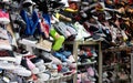 Stack of shoes irregularly in a shop on Sarijadi street, Bandung. Royalty Free Stock Photo