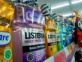 Bandung, Indonesia - March 17, 2022: Various flavors of Listerine mouthwash bottles on the minimarket shelf