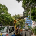 Workers install CCTV cameras in alun alun area, Bandung.