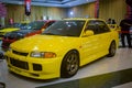 Yellow Mitsubishi Lancer evolution III GSR displayed in JDM Fest 2024 Royalty Free Stock Photo