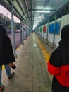 BANDUNG, INDONESIA - NOVEMBER 25 2020 Asian Muslim Woman Walking in the New Hallway of Bandung Station, Indonesia Royalty Free Stock Photo