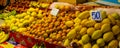 Exotic fresh Thai fruits at the night market in Pattaya Thailand: papaya, passion fruit, mangoes, tangerines, oranges Royalty Free Stock Photo