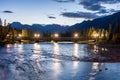 Banff Avenue Bridge over the bow river light up at summer night. Banff National Park. Royalty Free Stock Photo