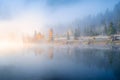 Banff National Park, Alberta, Canada. Fall. Landscape during sunrise. Autumn trees on the river bank. Mountains and forest.