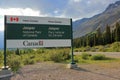 Jasper National Park with Parks Canada Entrance Sign at Sunwapta Pass in Evening Light, Canadian Rocky Mountains, Alberta