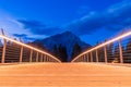 Banff Pedestrian Bridge Bow River trail light up at summer night. Banff National Park. Royalty Free Stock Photo