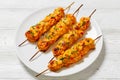 Bang Bang Chicken Skewers on plate, top view Royalty Free Stock Photo