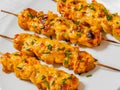 Bang Bang Chicken Skewers on plate, top view Royalty Free Stock Photo