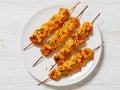 Bang Bang Chicken Skewers on plate, top view Royalty Free Stock Photo