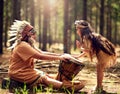 Bang that drum. a little girl banging a drum while playing dressup with her mother in the woods.