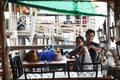 Bang KhunThai woman waiting food at Bang Khun Thian restaurant Royalty Free Stock Photo