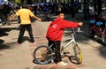 Bang Saen, Thailand: Boy on Bicycle on Promenade