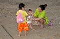 Bang Saen, Thailand: Mother with Children on Beach