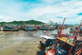 Bang Saray Pier - boats run aground in the mud at low tide