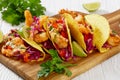 Bang Bang Shrimp Tacos on wood board, top view