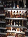 Bangalore, India: Traditional shoes footwears or Juttis of various designs on display made from leather and