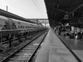 Closeup of Yesvantpur Junction railway station inside view of station corridor, escalator, pedestrian path, trains in a platform