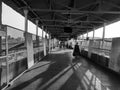 Closeup of Yesvantpur Junction railway station inside view of station corridor, escalator, pedestrian path, trains in a platform