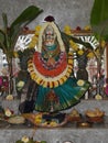 Closeup of beautiful goddess Vara Mahalakshmi decoration with flowers, fruits