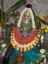 Closeup of beautiful goddess Vara Mahalakshmi decoration with flowers, fruits