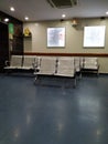 Closeup of Empty Steel Chairs at the Entrance or Opposite of Reception of Fortis Hospital, Rajajinagar. Hospital waiting room with