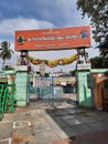 Closeup of Sri Gavi Gangadhareshwara Temple with Entrance gate, Corridor with Name board and information board