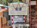 Closeup of Sri Gavi Gangadhareshwara Temple with Entrance gate, Corridor with Name board and information board