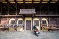 The exterior facade of Tipu Sultan`s Summer palace with ornate wooden furnishings in