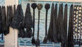 Bangalore,Karnataka,India-January 01 2023: Womens black hair wig on sale in Shivaji nagar