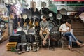 Workers selling metal utensils, kitchenware and hardware at the KR Market in the city